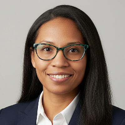 Jessica Lin, EPRI. Woman with long dark hair, wearing glasses, a navy blazer, and a white shirt, smiling at the camera against a gray background.